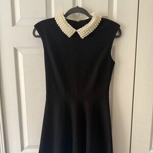 Chic Black with elegant pearl collar
